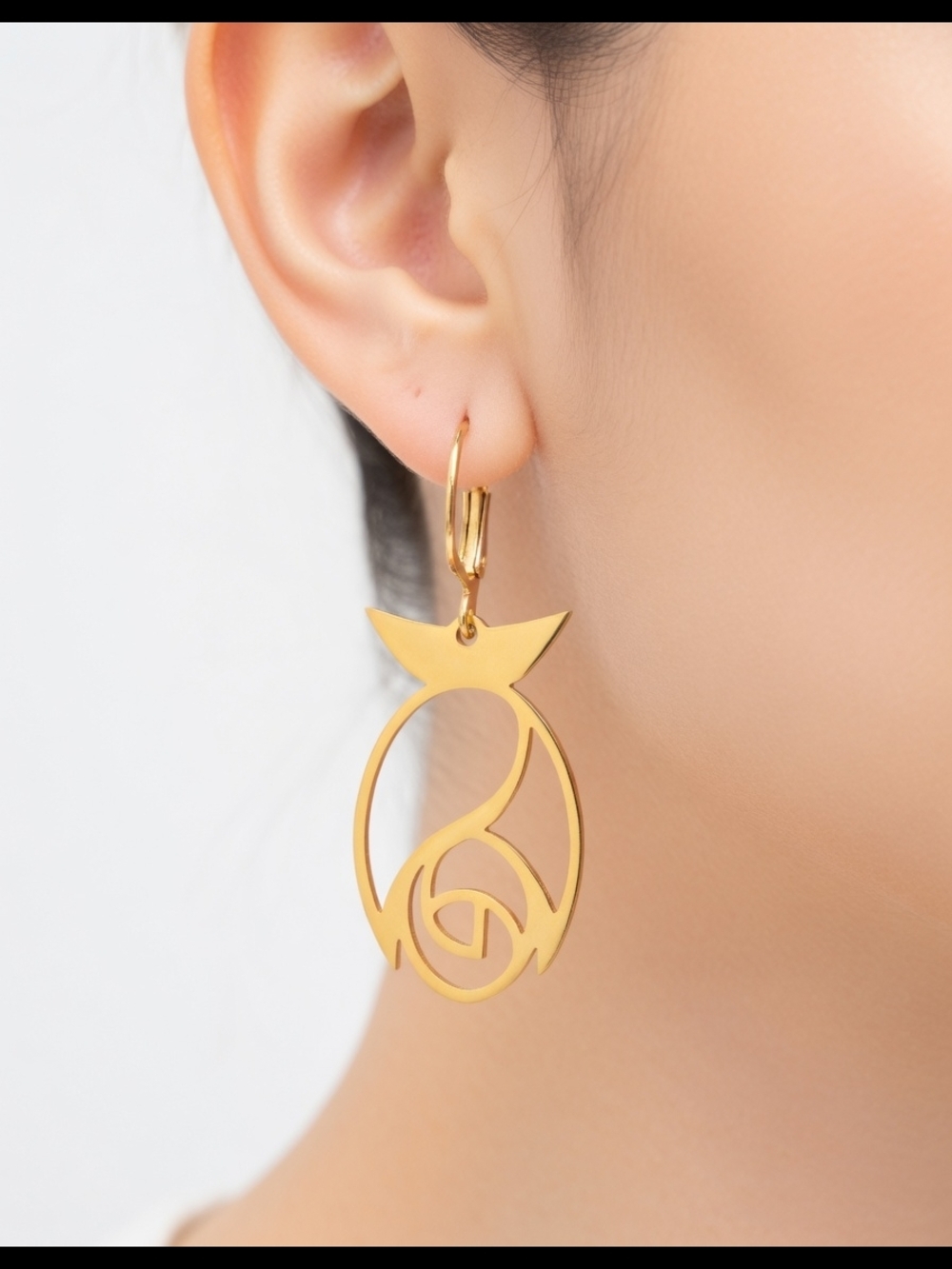 Earrings crafted from stainless steel with 18K gold plating.